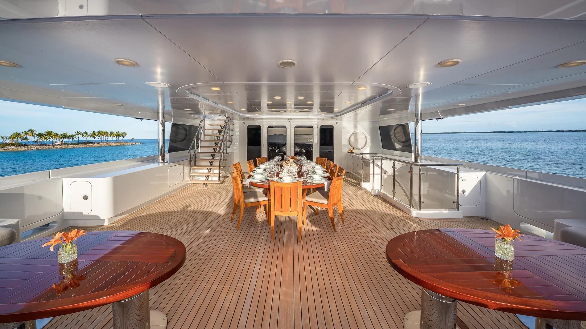 a large room with tables and chairs aboard HOLDIN' MY OWN Yacht for Sale