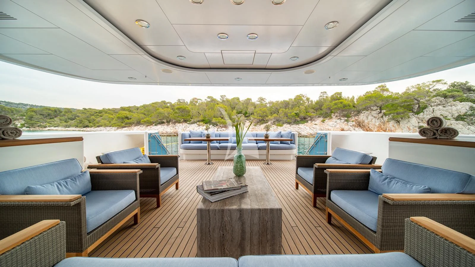 a large room with couches and a table aboard HOLDIN' MY OWN Yacht for Sale