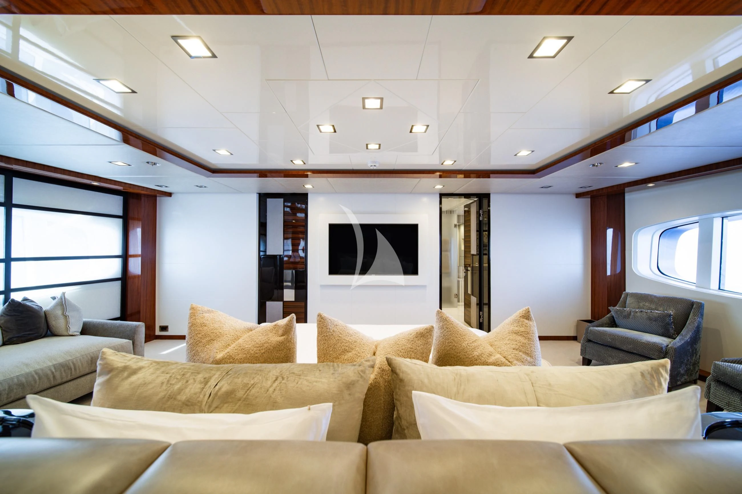 a living room with a large screen aboard HOLDIN' MY OWN Yacht for Sale