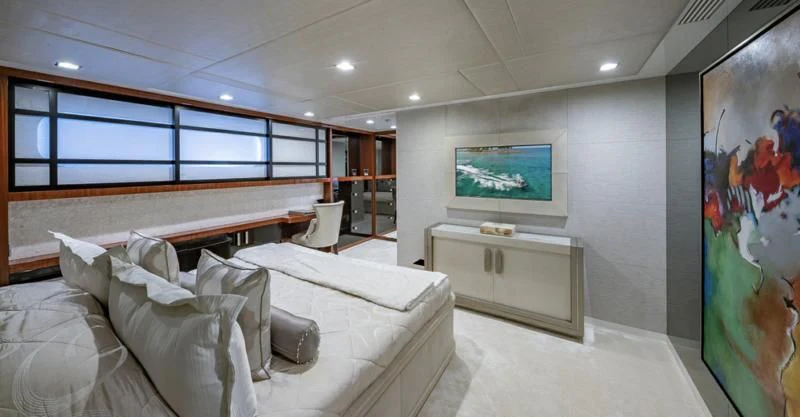 a room with a bed and a tv aboard HOLDIN' MY OWN Yacht for Sale