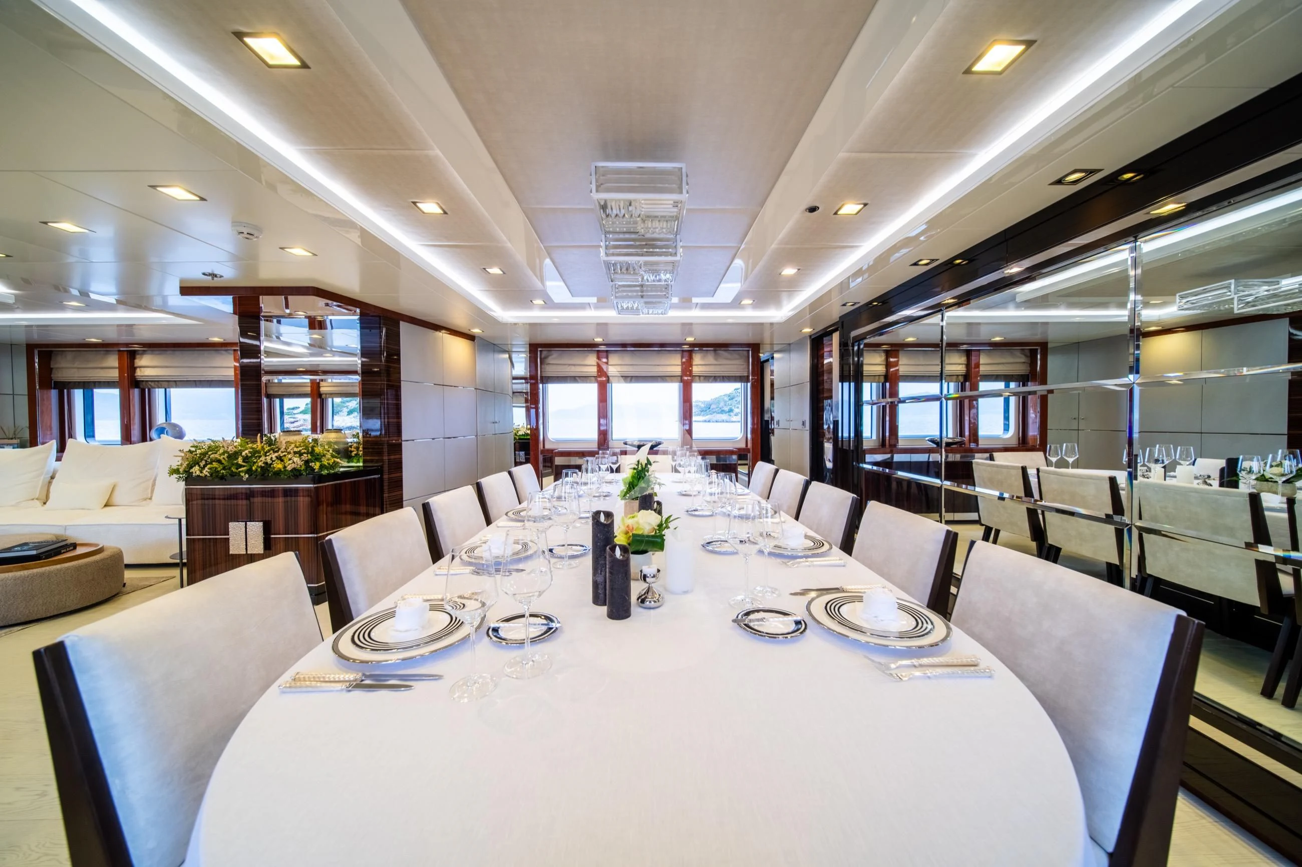 a large room with tables and chairs aboard HOLDIN' MY OWN Yacht for Sale