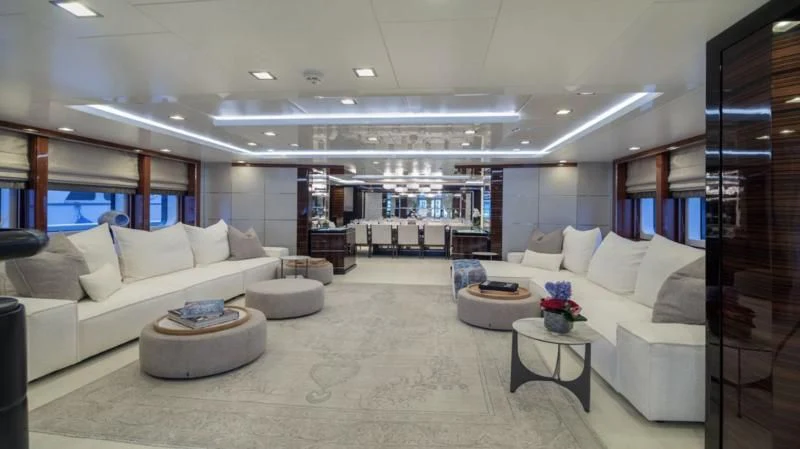 a living room with a large window aboard HOLDIN' MY OWN Yacht for Sale