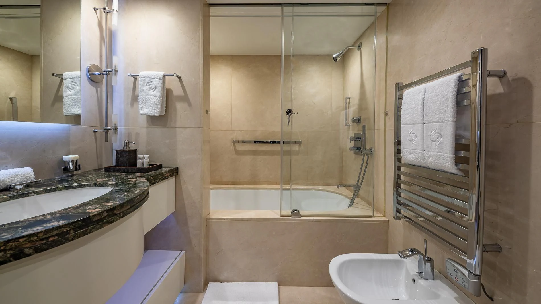 a bathroom with a shower sink and a mirror aboard HOLDIN' MY OWN Yacht for Sale