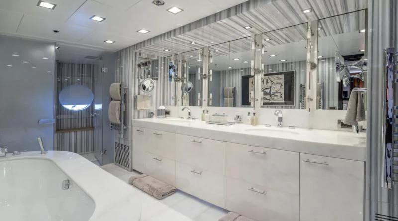 a bathroom with a large mirror aboard HOLDIN' MY OWN Yacht for Sale