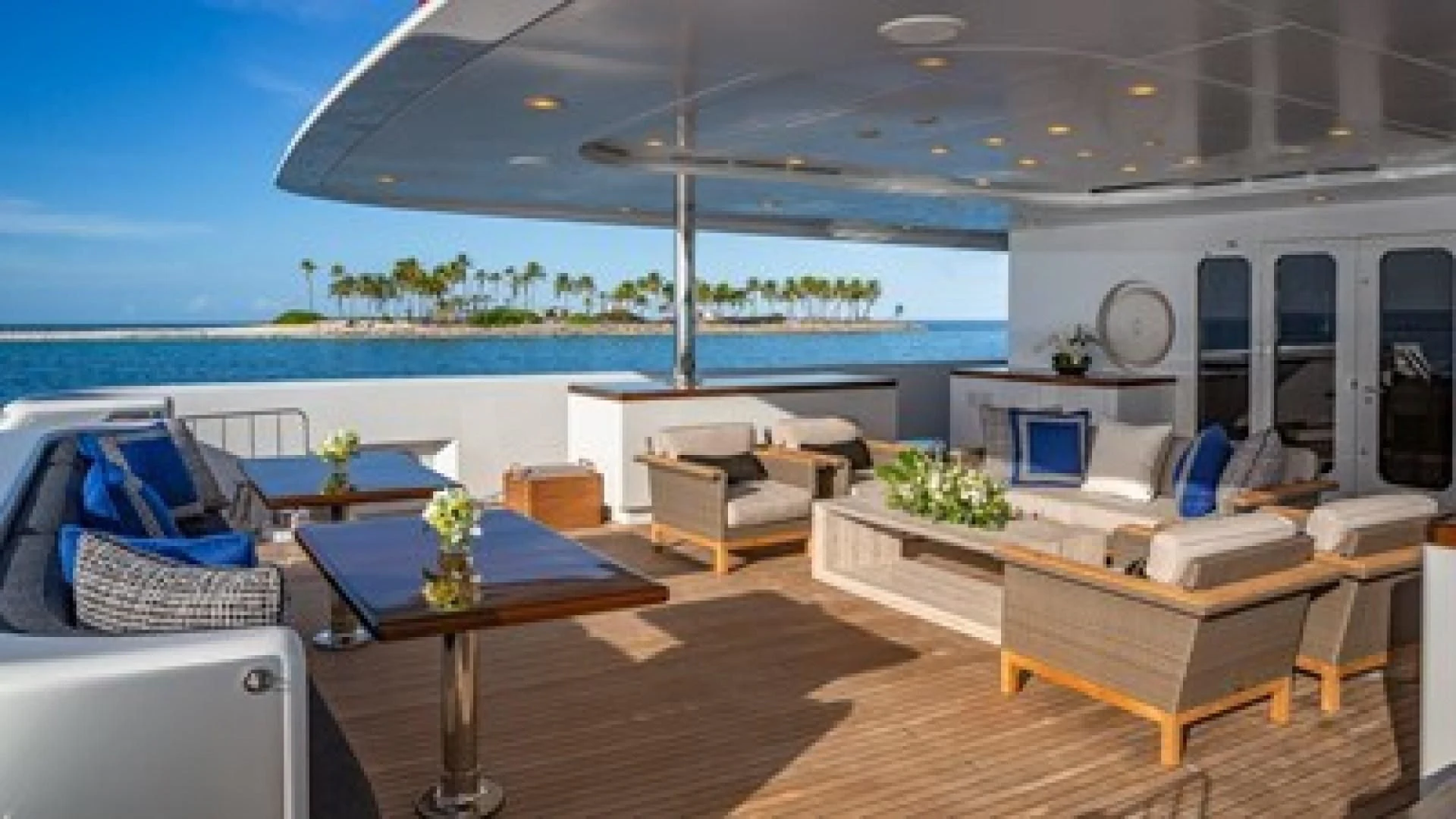 a living room with a large patio aboard HOLDIN' MY OWN Yacht for Sale