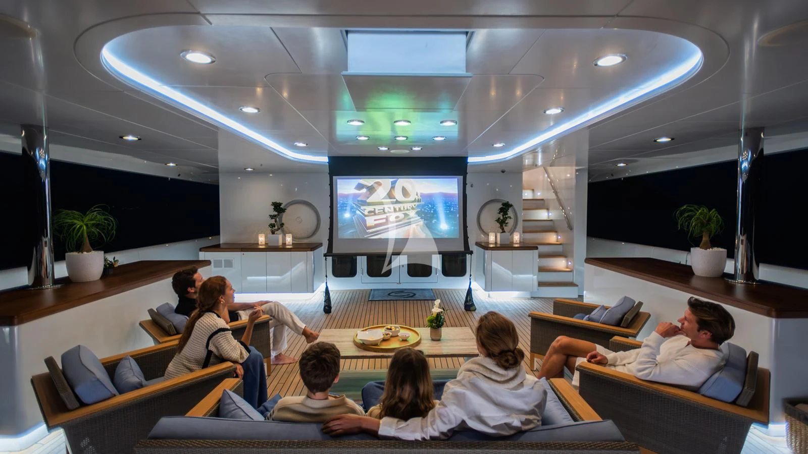 a group of people sitting around a table in a room aboard HOLDIN' MY OWN Yacht for Sale