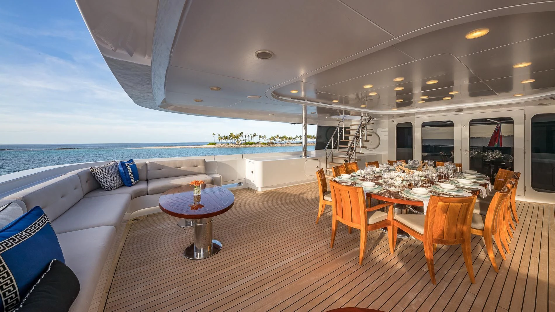a large room with a table and chairs and a large window aboard HOLDIN' MY OWN Yacht for Sale