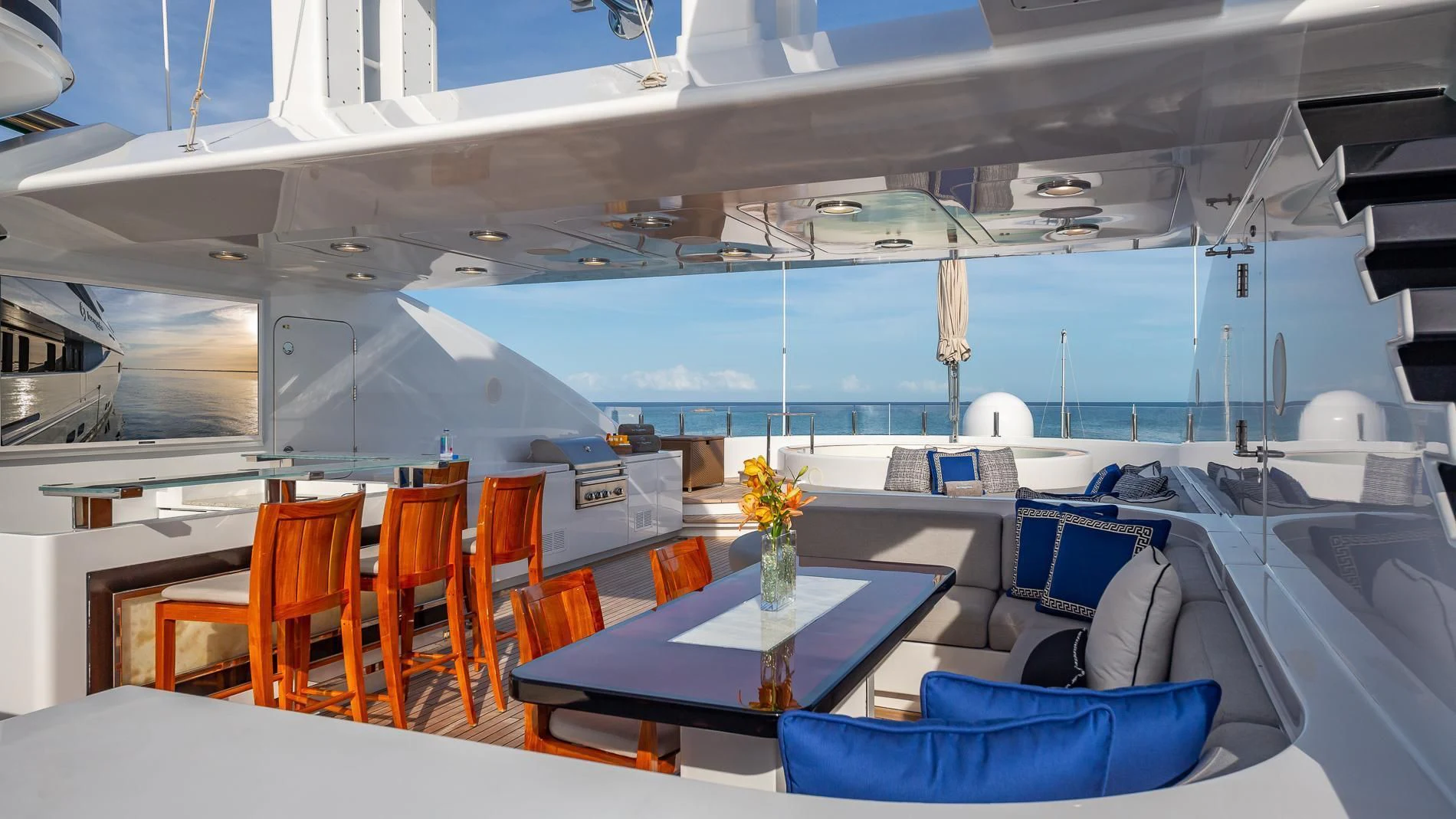 a room with chairs and tables aboard HOLDIN' MY OWN Yacht for Sale