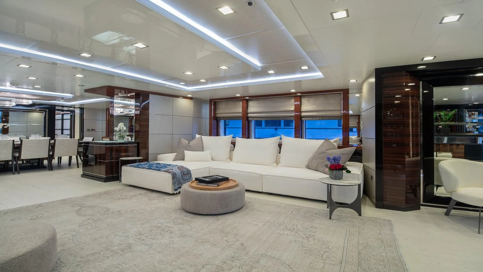 a large room with a couch and a table aboard HOLDIN' MY OWN Yacht for Sale