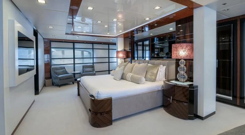 a large bedroom with a large bed aboard HOLDIN' MY OWN Yacht for Sale