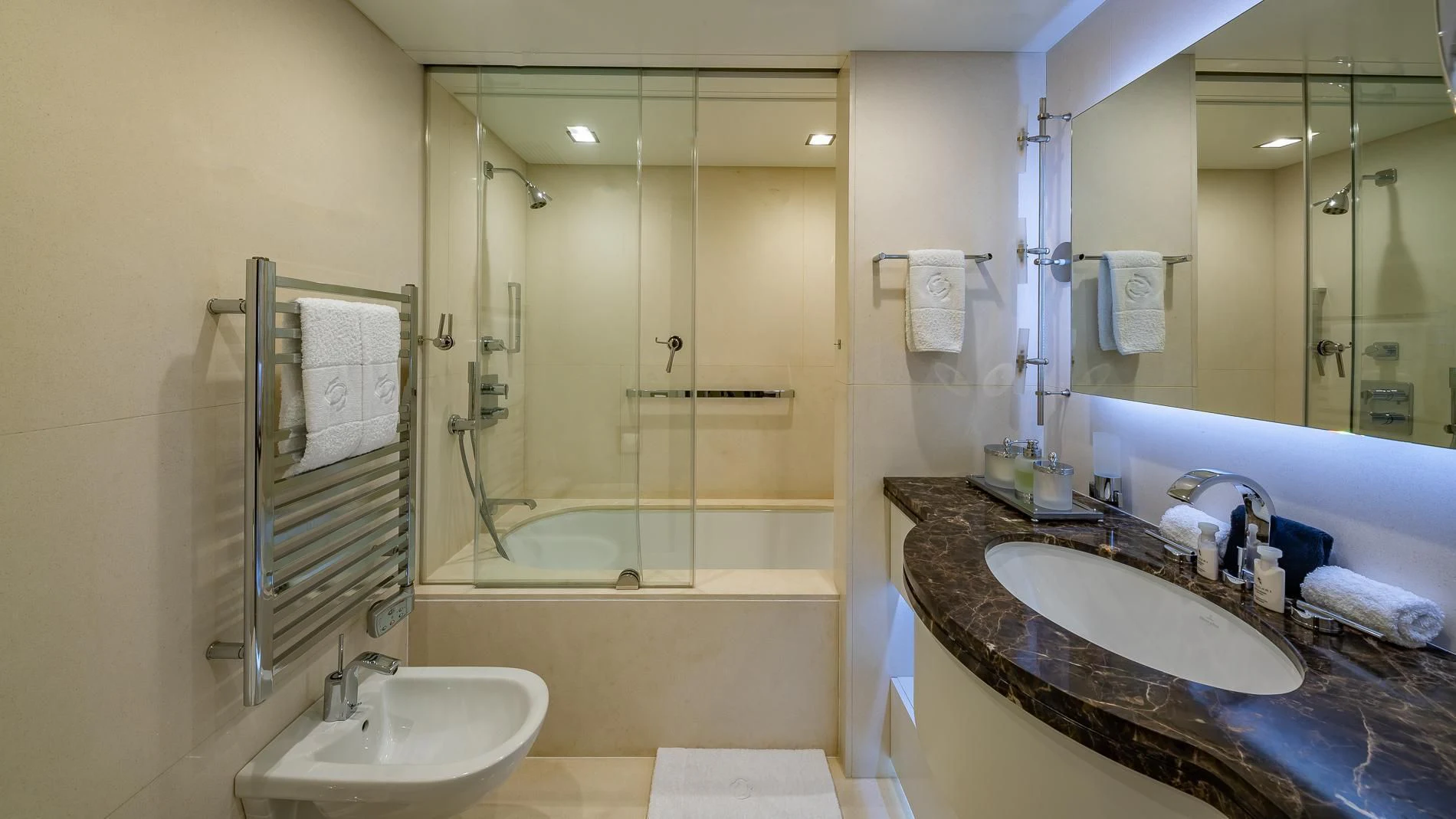a bathroom with a tub sink and a shower unit aboard HOLDIN' MY OWN Yacht for Sale