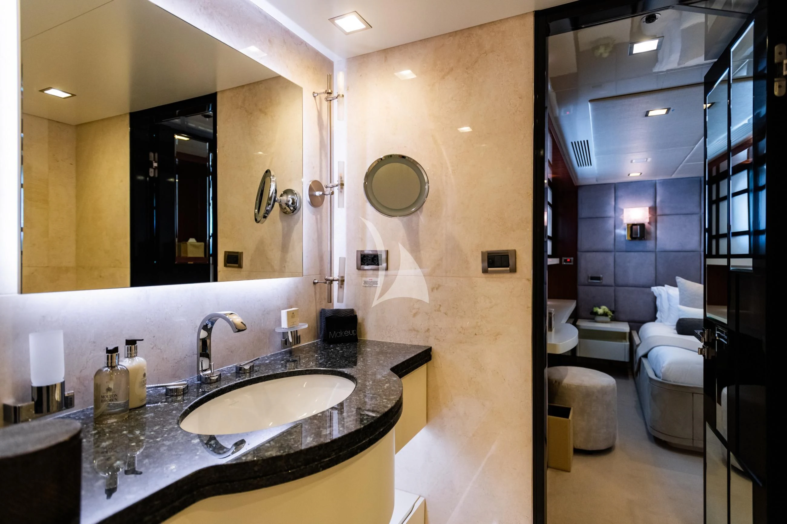 a bathroom with a large mirror aboard HOLDIN' MY OWN Yacht for Sale
