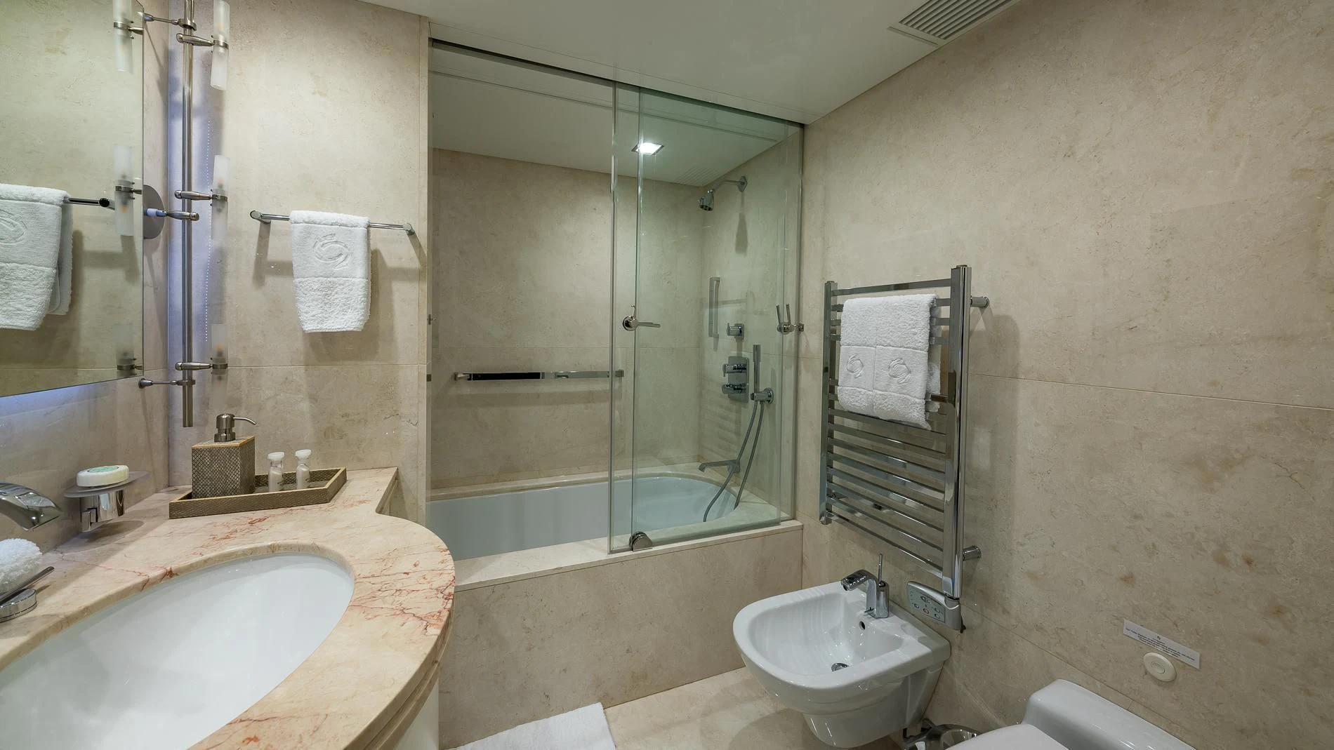 a bathroom with a glass shower aboard HOLDIN' MY OWN Yacht for Sale