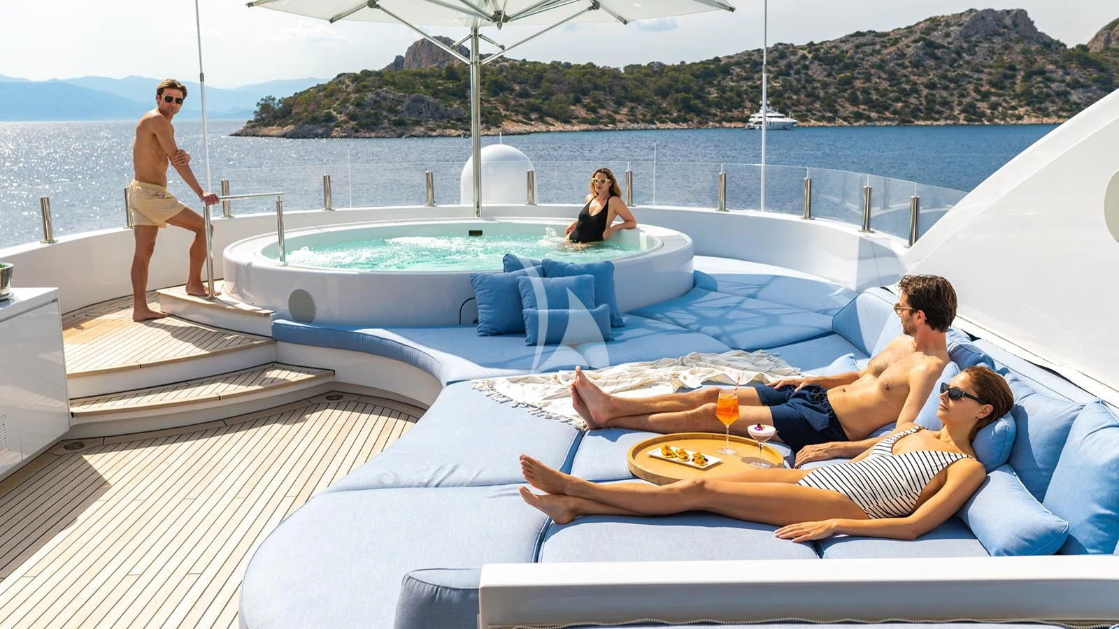 a group of people on a lounge chair on a boat aboard HOLDIN' MY OWN Yacht for Sale