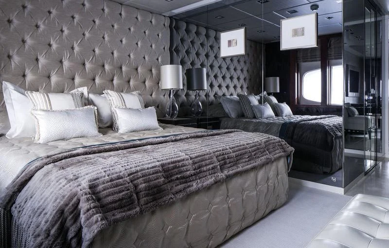a large bedroom with a bed aboard HOLDIN' MY OWN Yacht for Sale