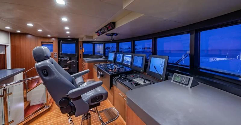 a room with many computer screens aboard HOLDIN' MY OWN Yacht for Sale
