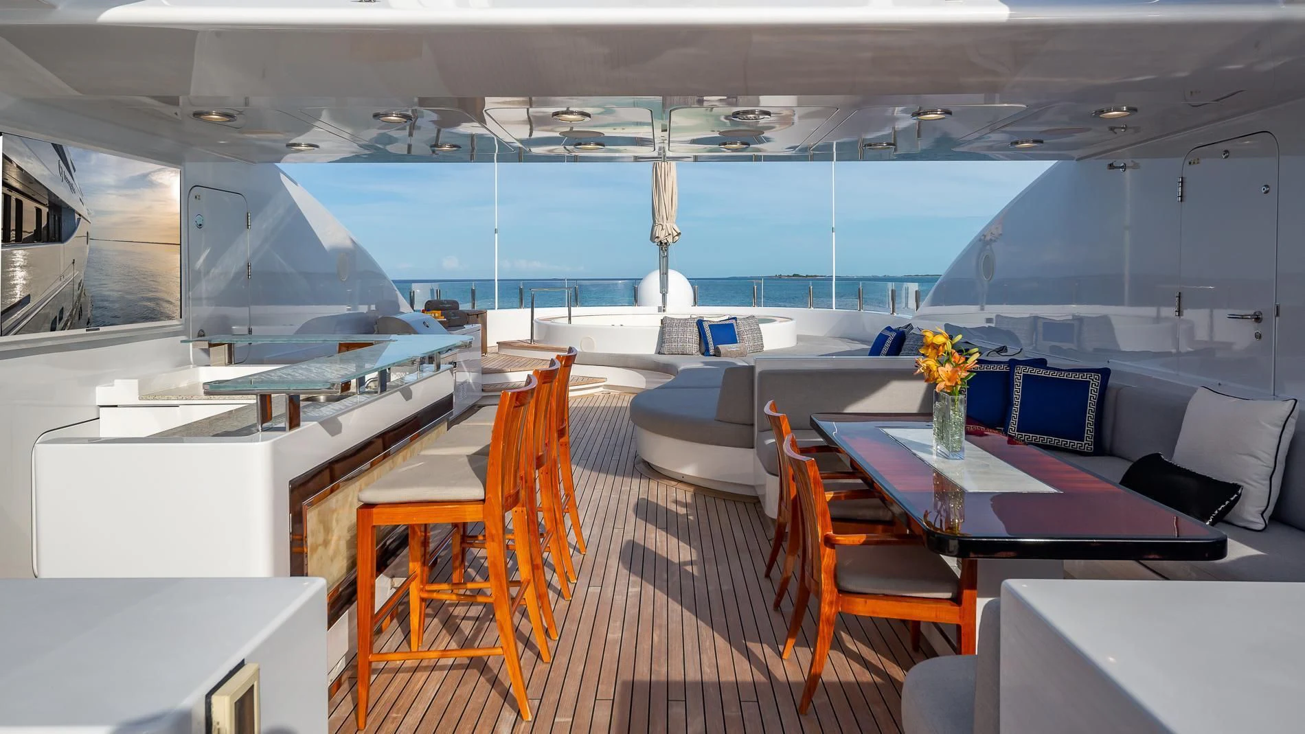 a room with a table chairs and a large window aboard HOLDIN' MY OWN Yacht for Sale