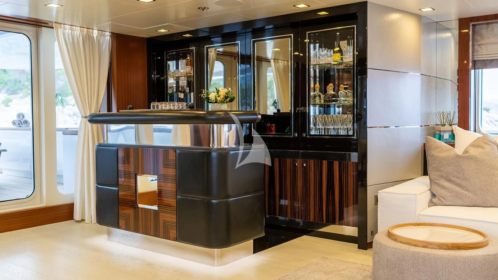 a kitchen with a large black refrigerator aboard HOLDIN' MY OWN Yacht for Sale