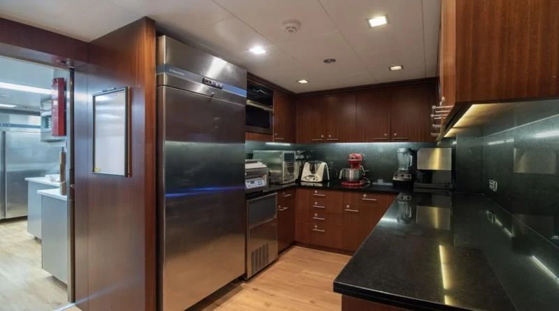 a kitchen with stainless steel appliances aboard HOLDIN' MY OWN Yacht for Sale