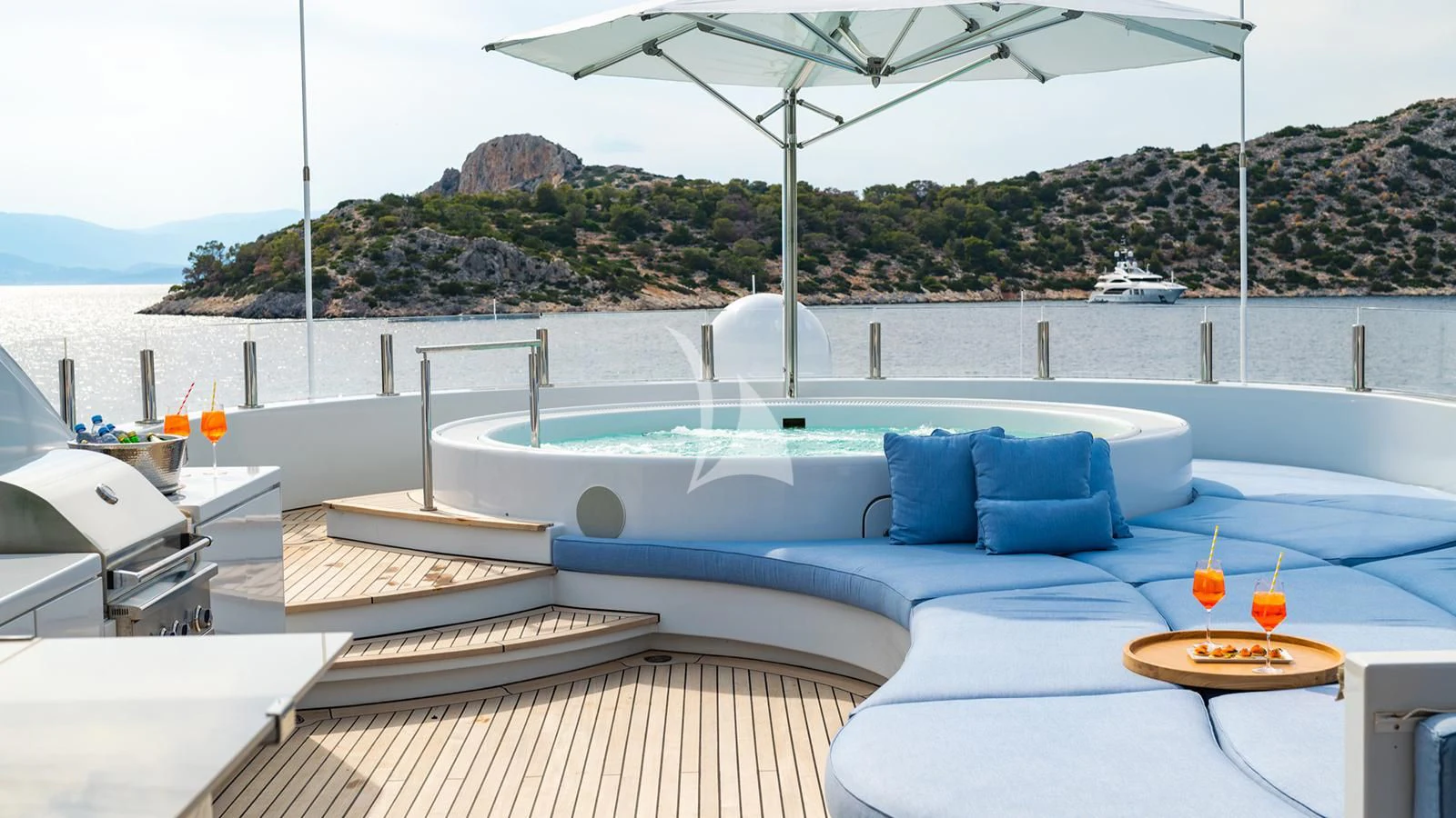 a lounge area with a pool and a view of a city aboard HOLDIN' MY OWN Yacht for Sale
