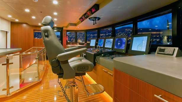 a room with many monitors and computers aboard HOLDIN' MY OWN Yacht for Sale