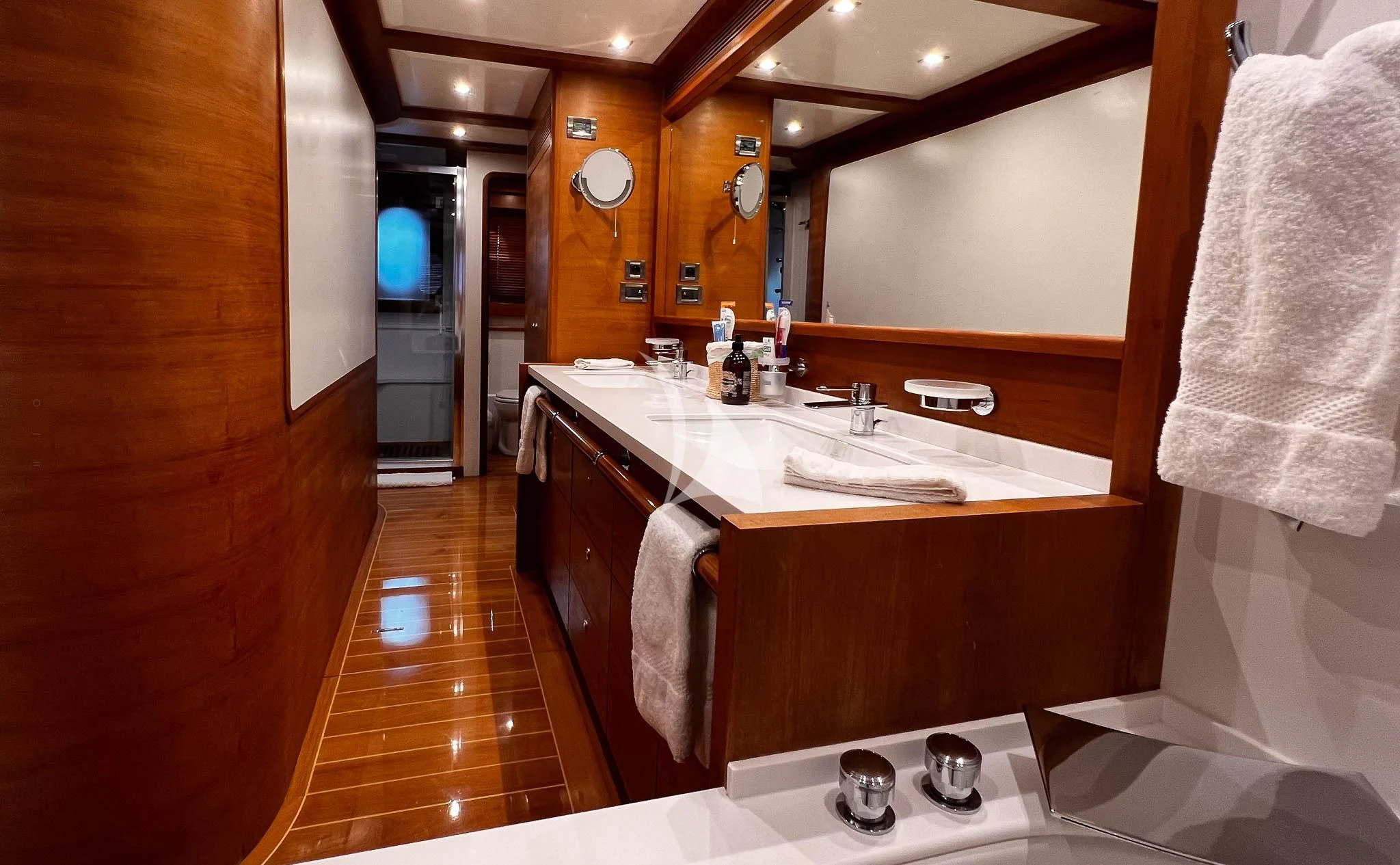 a bathroom with a countertop sink and a mirror aboard LADY EMMA Yacht for Sale