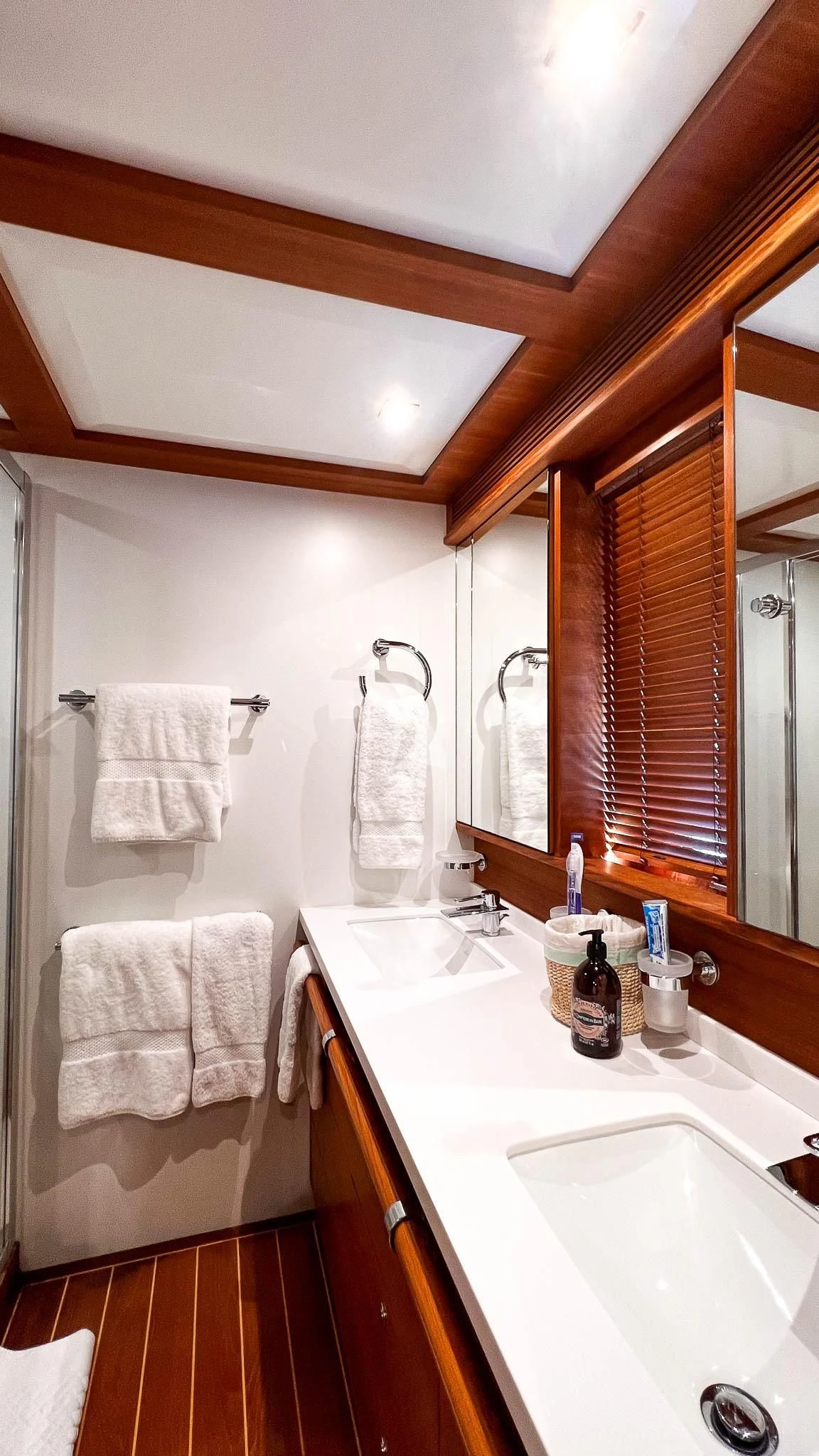 a bathroom with a sink and a mirror aboard LADY EMMA Yacht for Sale