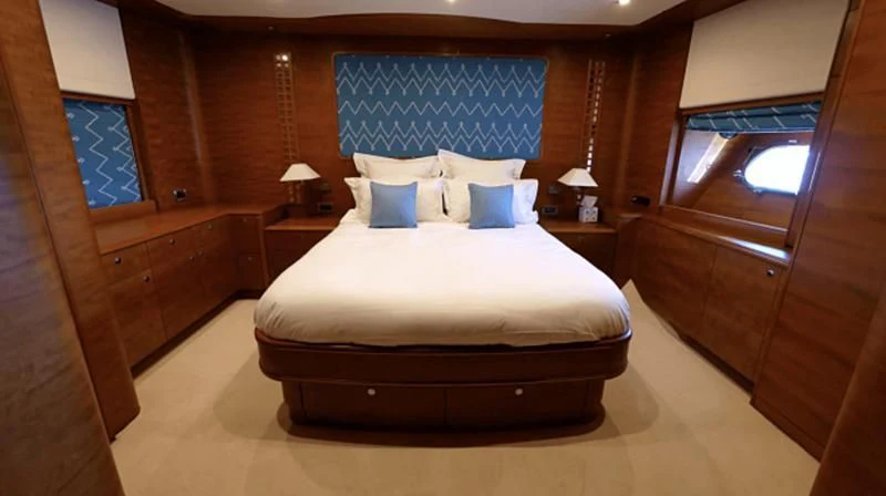 a bed in a room aboard LADY EMMA Yacht for Sale