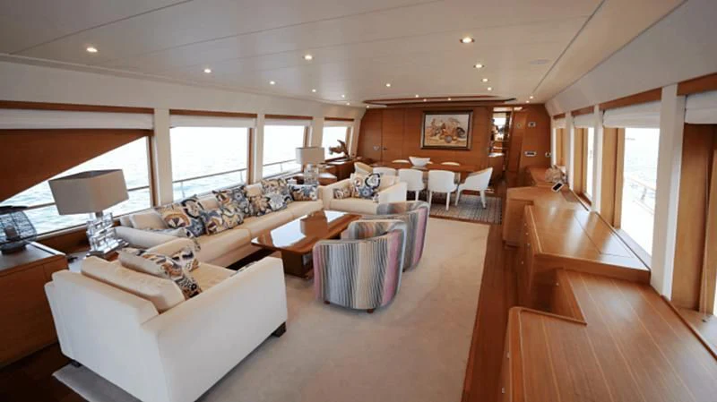a living room with a large window aboard LADY EMMA Yacht for Sale