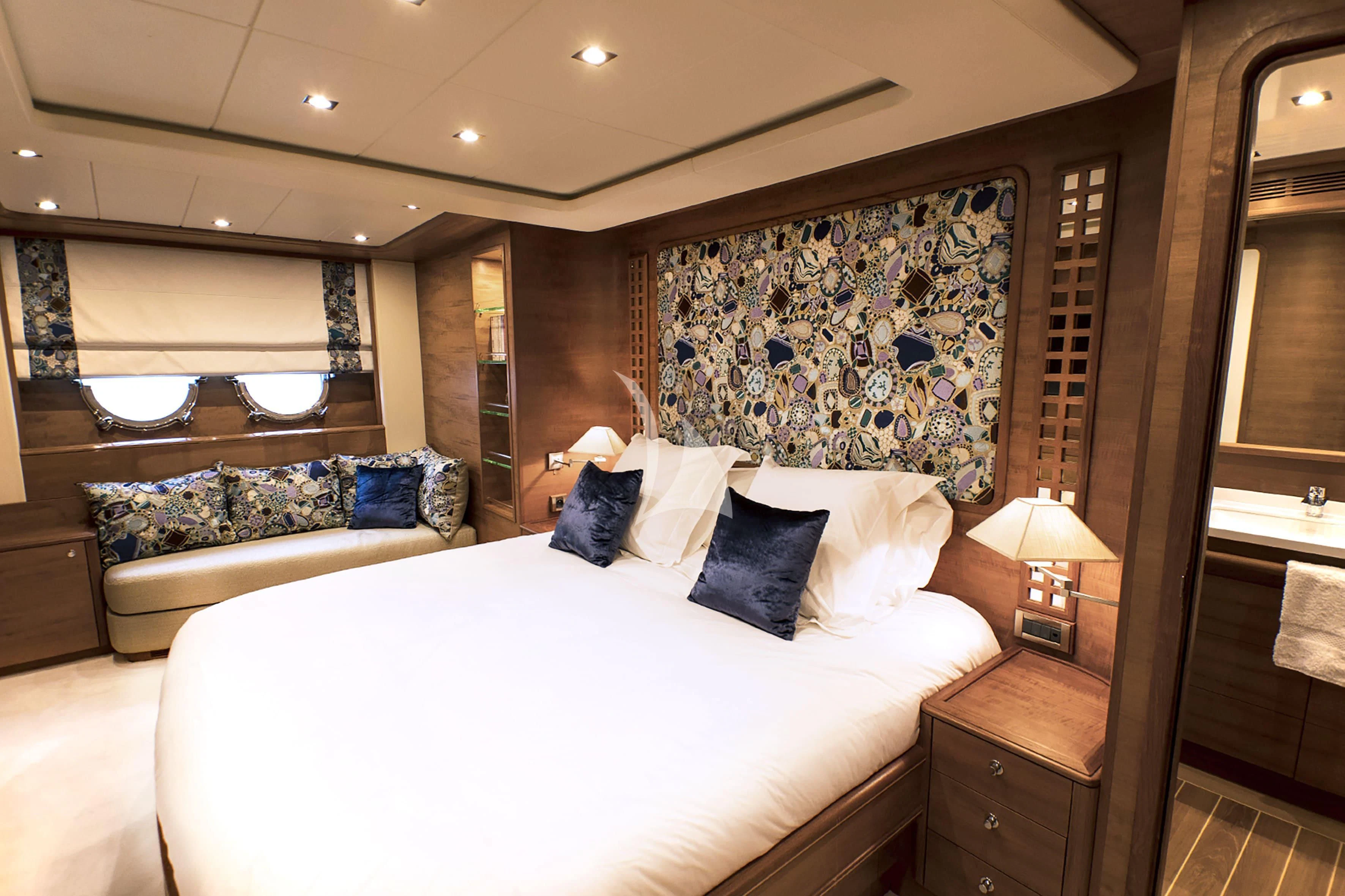 a large bed in a hotel room aboard LADY EMMA Yacht for Sale