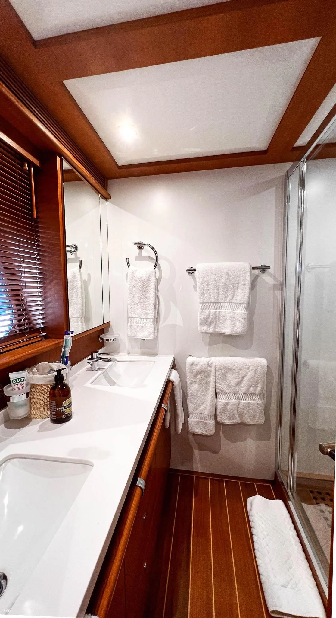 a bathroom with a sink and a shower aboard LADY EMMA Yacht for Sale