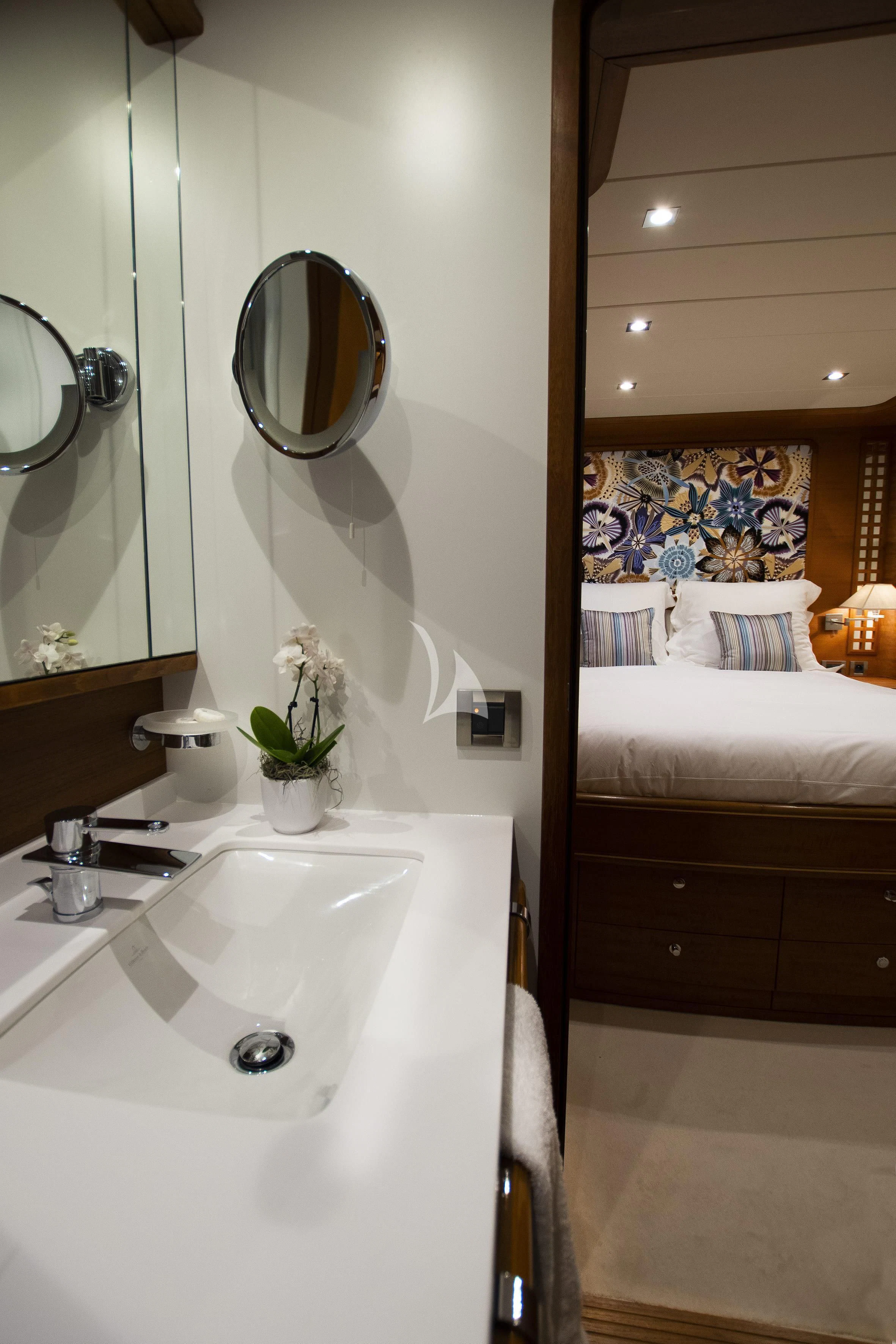 a bathroom with a sink and a mirror aboard LADY EMMA Yacht for Sale