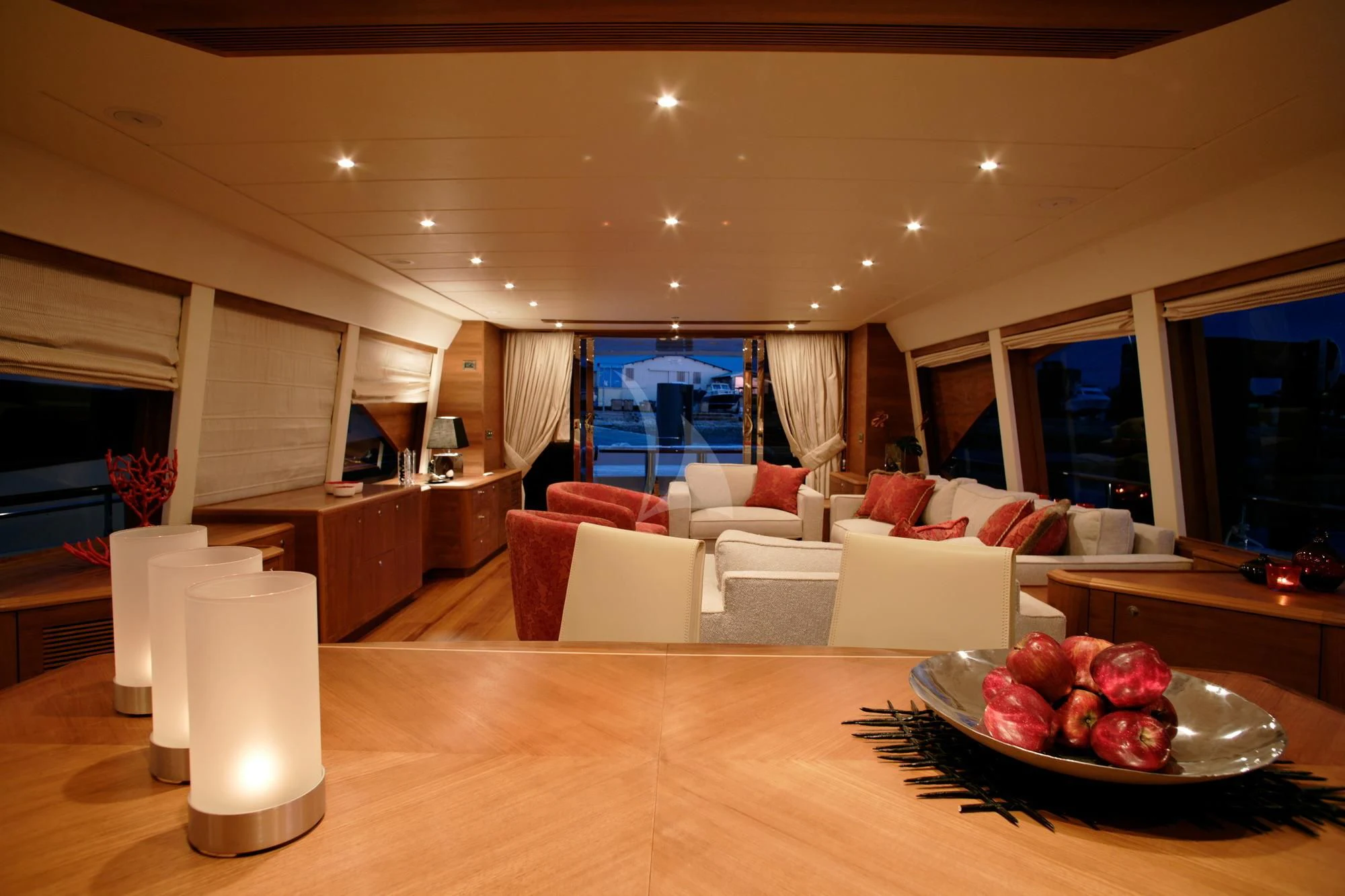 a living room with a table and couches aboard LADY EMMA Yacht for Sale
