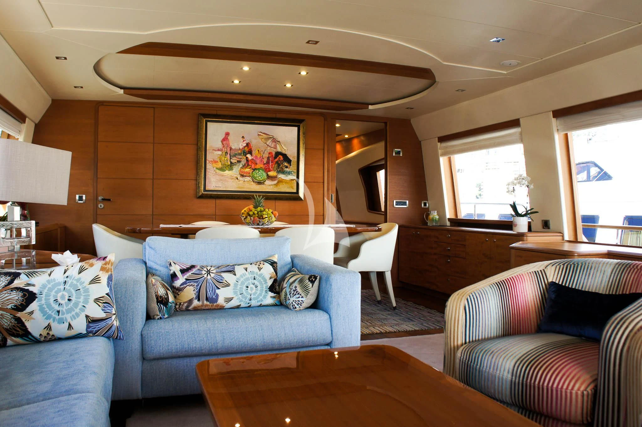 a living room with a couch and a table aboard LADY EMMA Yacht for Sale