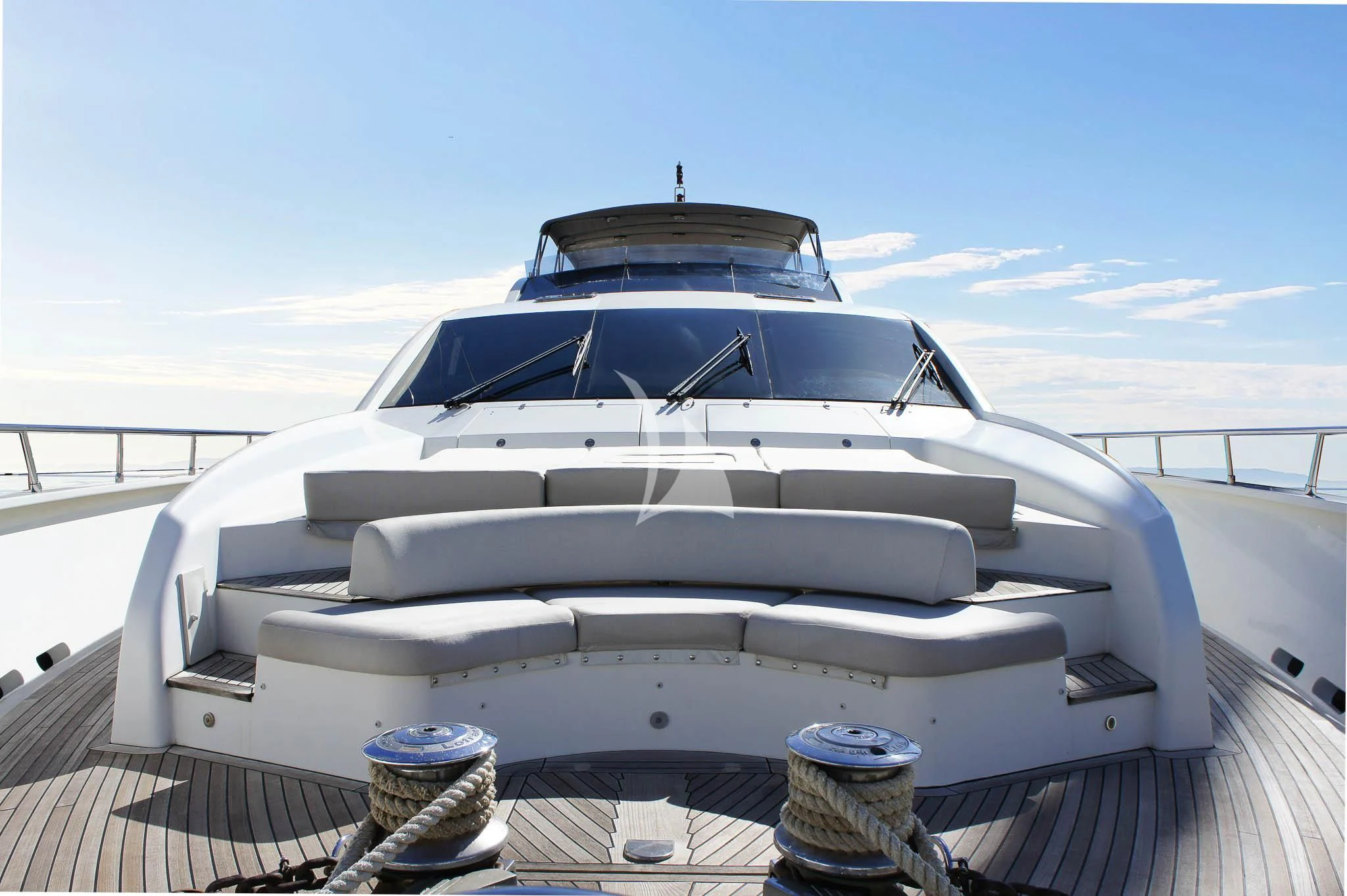 a white yacht on a deck aboard LADY EMMA Yacht for Sale