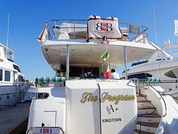 a boat docked at a pier aboard DREAM ON Yacht for Sale