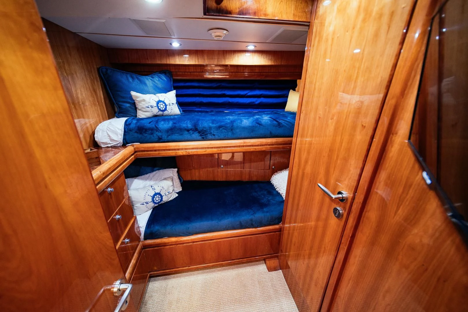 a room with bunk beds aboard DREAM ON Yacht for Sale