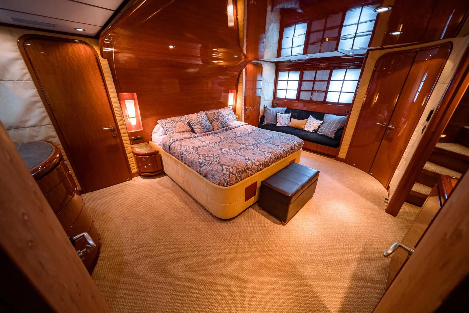 a room with a bed and a couch aboard DREAM ON Yacht for Sale
