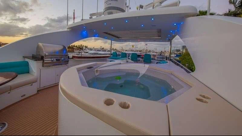 a large cruise ship in a harbor aboard DREAM ON Yacht for Sale