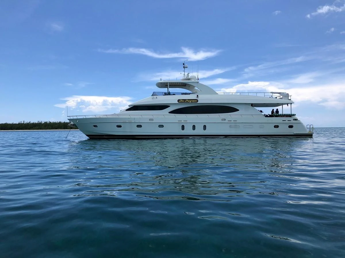a white yacht in the water aboard DREAM ON Yacht for Sale