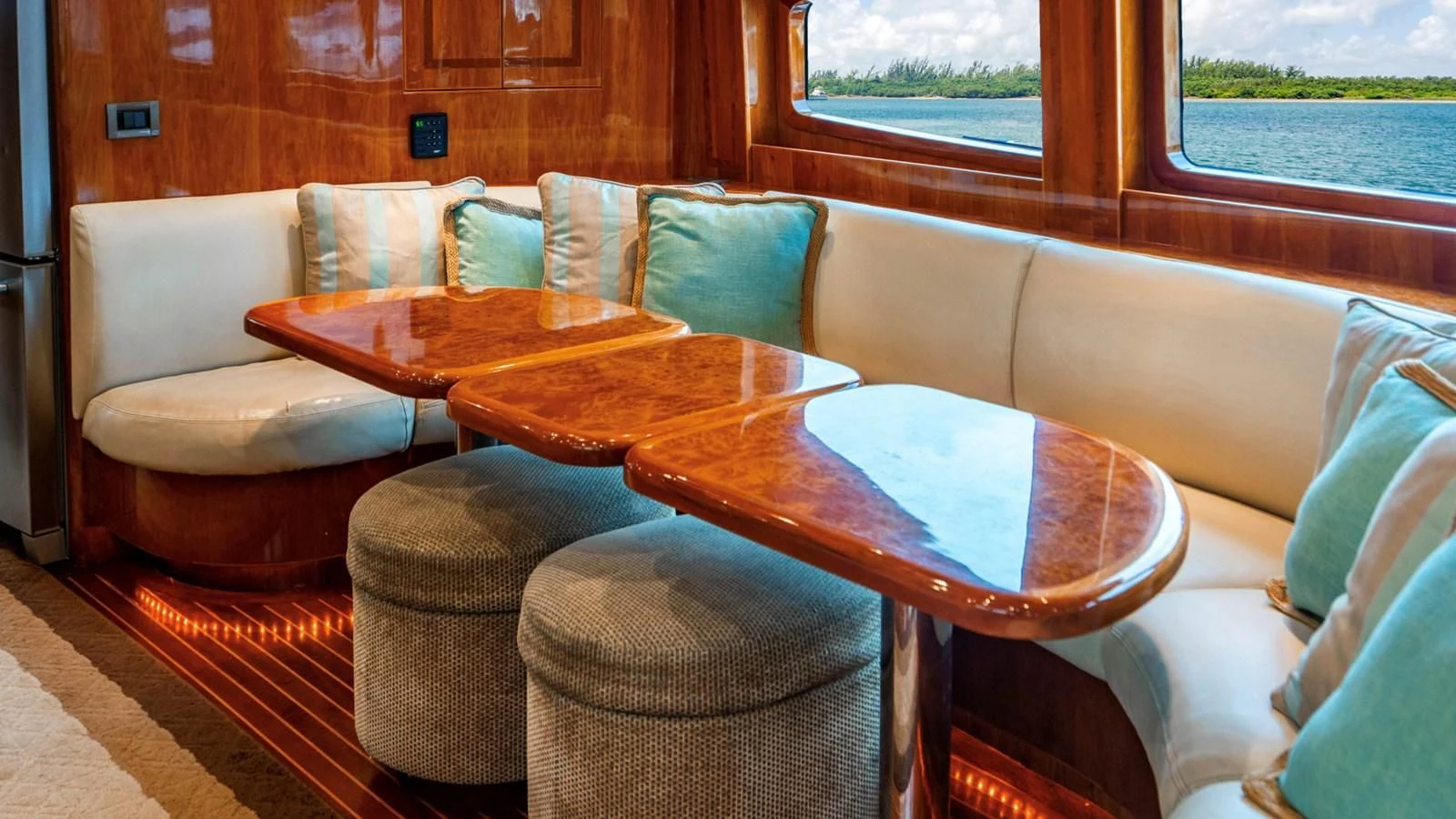 a couch and a table in a room aboard DREAM ON Yacht for Sale