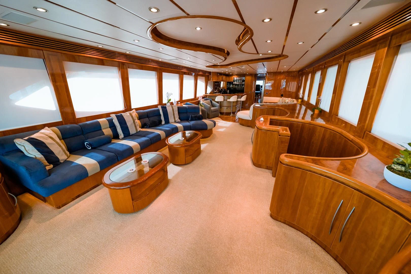 a large living room with a large window aboard DREAM ON Yacht for Sale