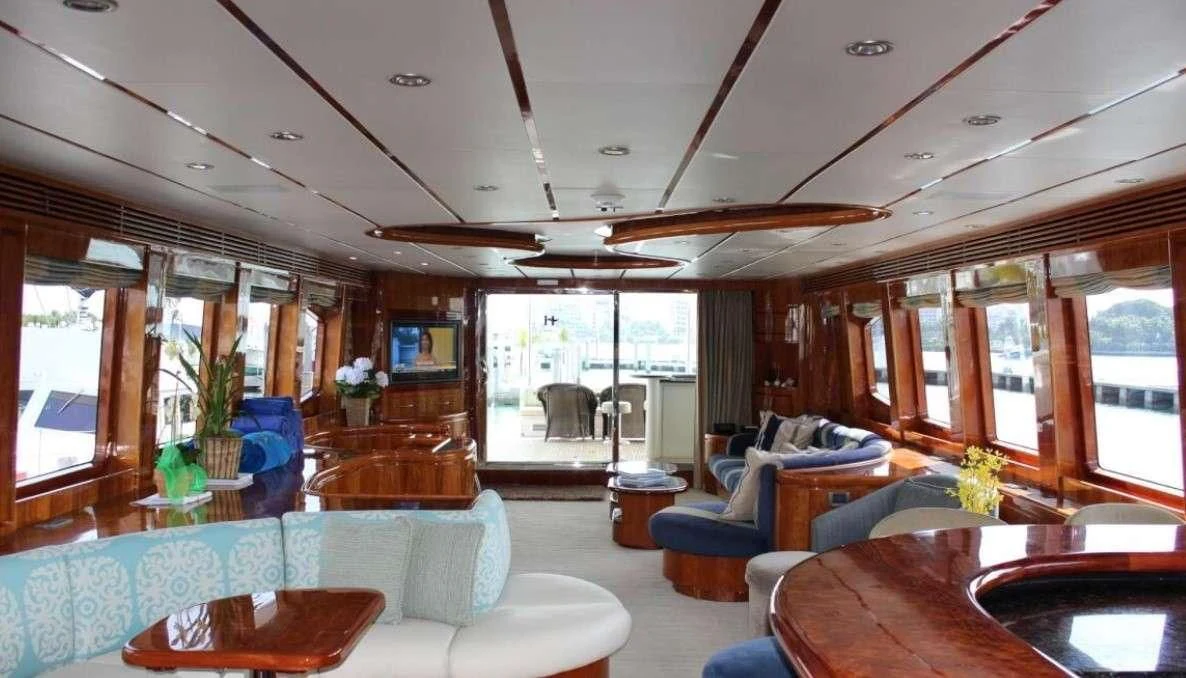 a living room with a large window aboard DREAM ON Yacht for Sale
