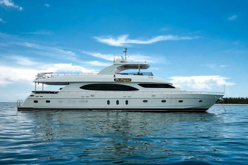 a white yacht on the water aboard DREAM ON Yacht for Sale