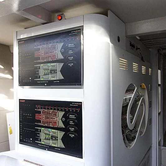 a large white machine aboard ENERGY OBSERVER Yacht for Sale