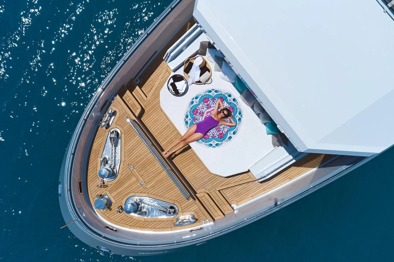 a person sitting on a boat aboard BERING 88/05 Yacht for Sale
