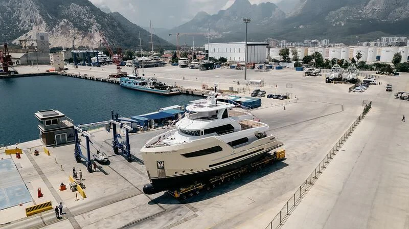 a group of boats are parked on a dock aboard BERING 88/05 Yacht for Sale