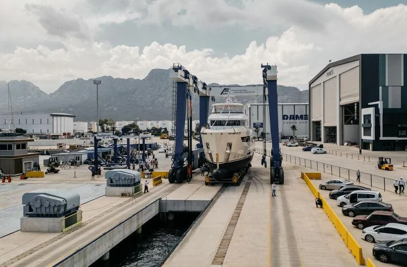 a large ship docked at a port aboard BERING 88/05 Yacht for Sale