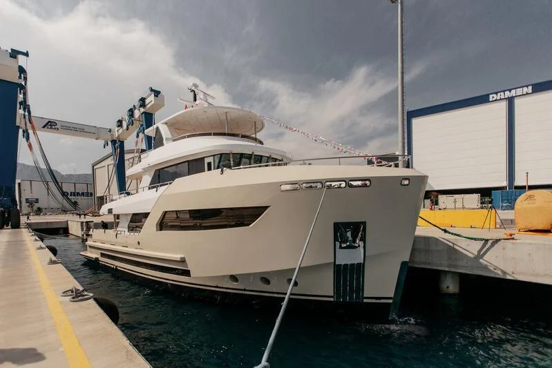 a white boat docked aboard BERING 88/05 Yacht for Sale