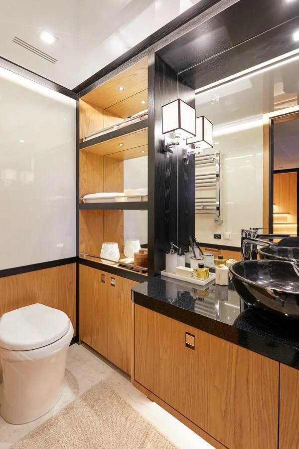 a bathroom with a sink and a toilet aboard BERING 88/05 Yacht for Sale